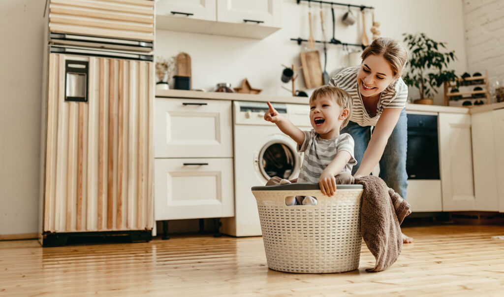mother and child in kitchen of property purchased with knightbain estate agent
